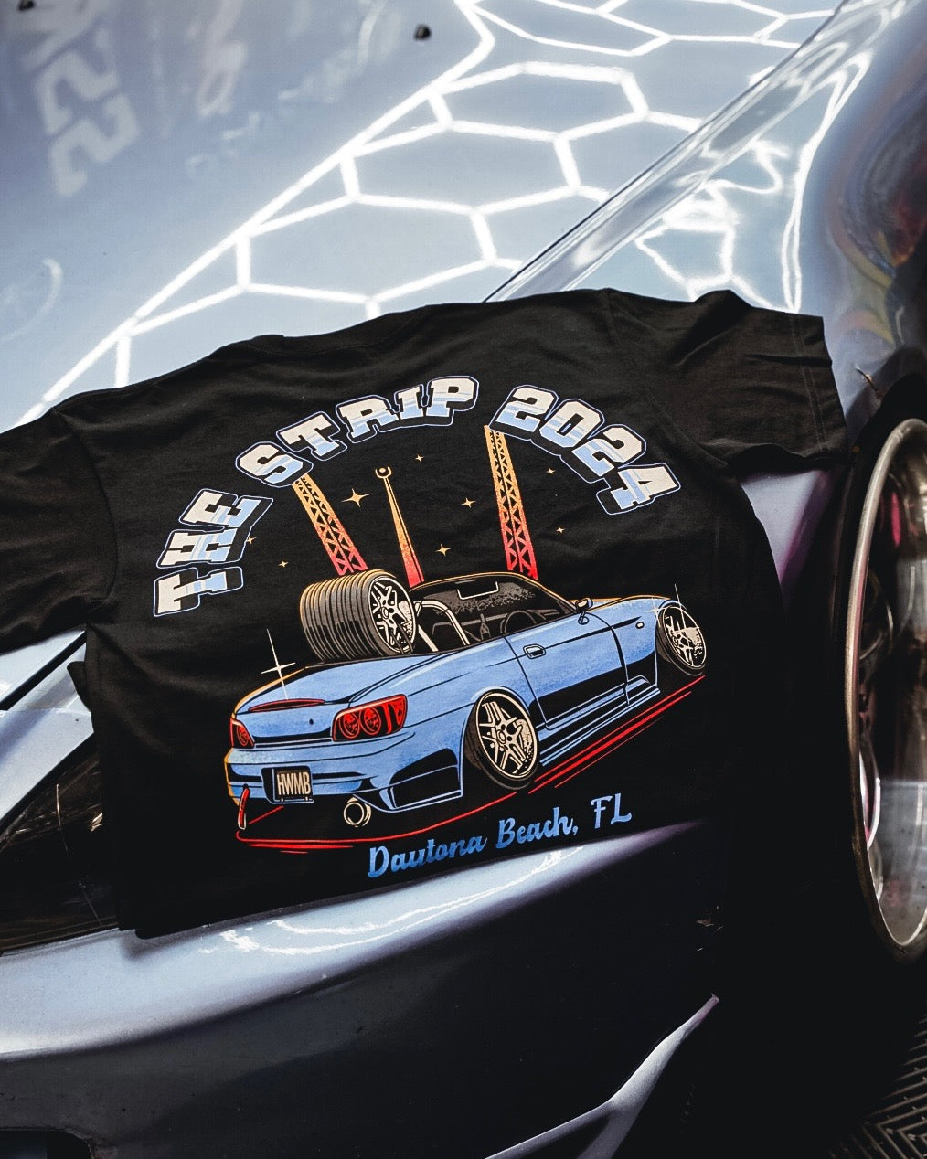 THE STRIP TEE